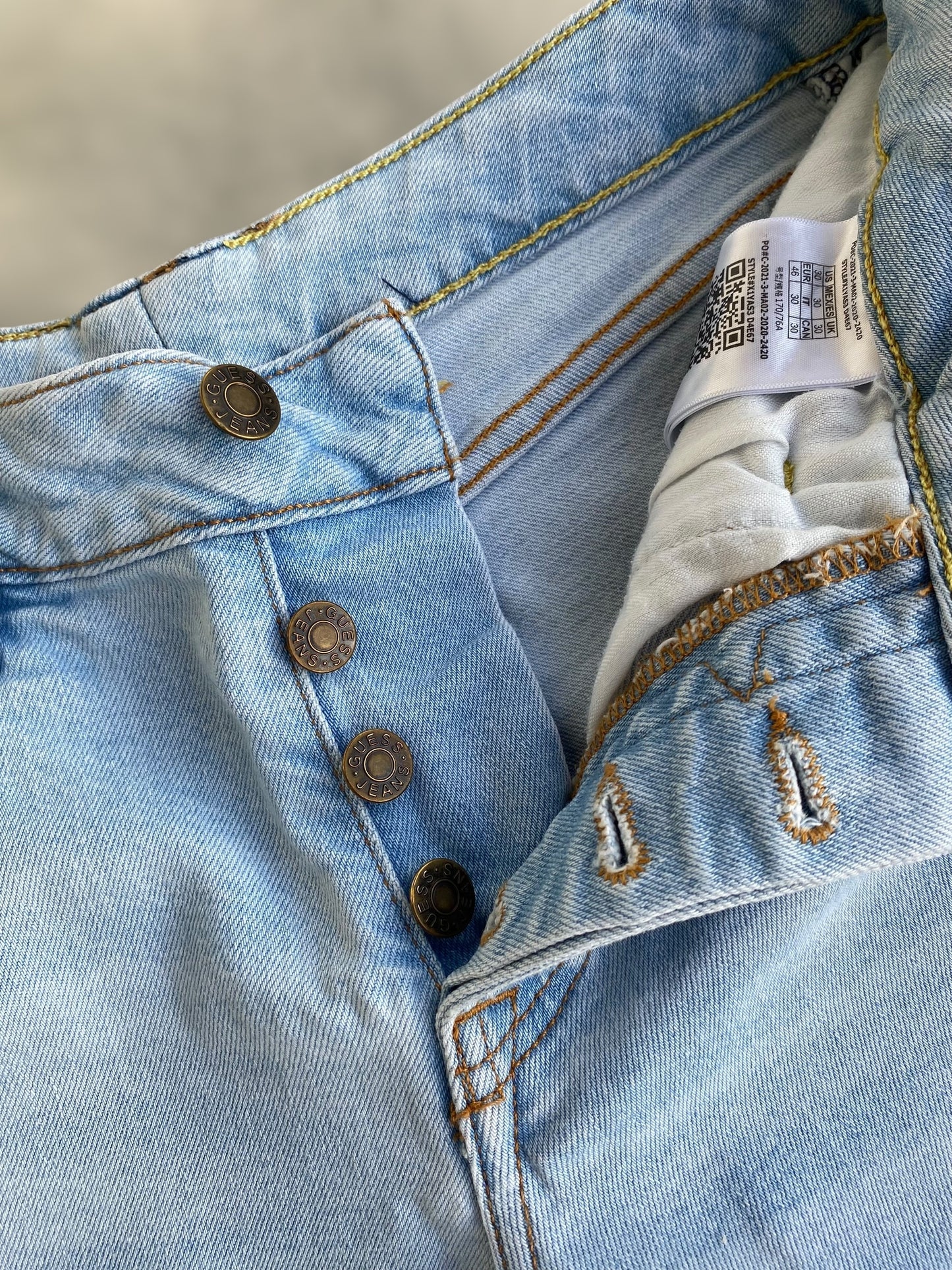 Guess ligh washed low waisted jeans