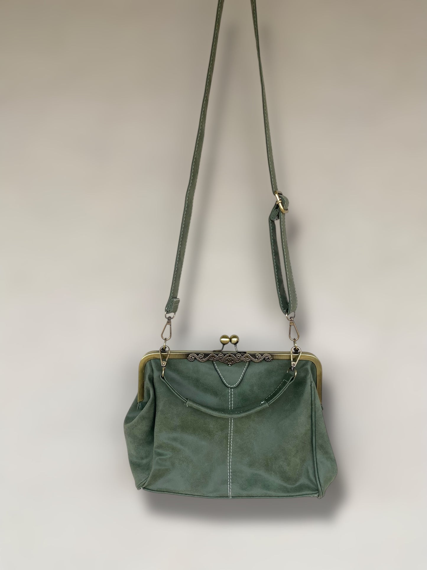 Sage green vintage suede leather clutch bag.