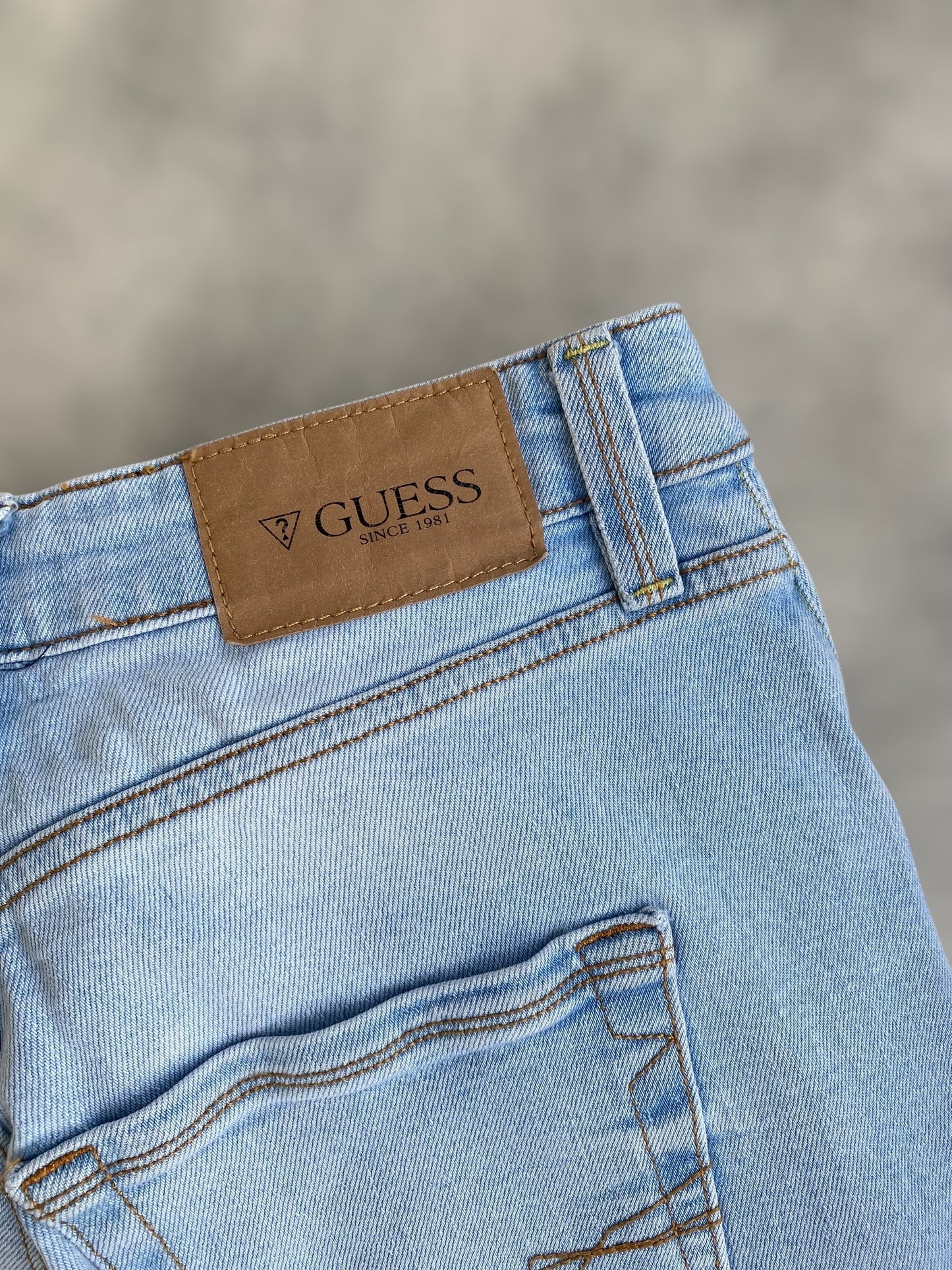 Guess ligh washed low waisted jeans