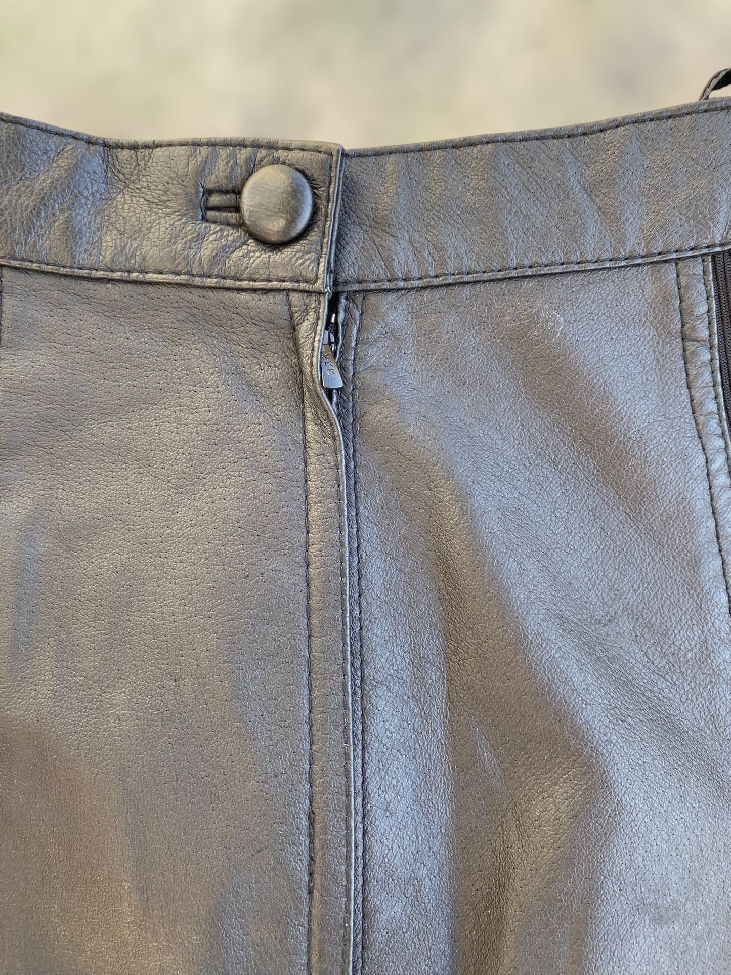Black leather skirt with elastic sides