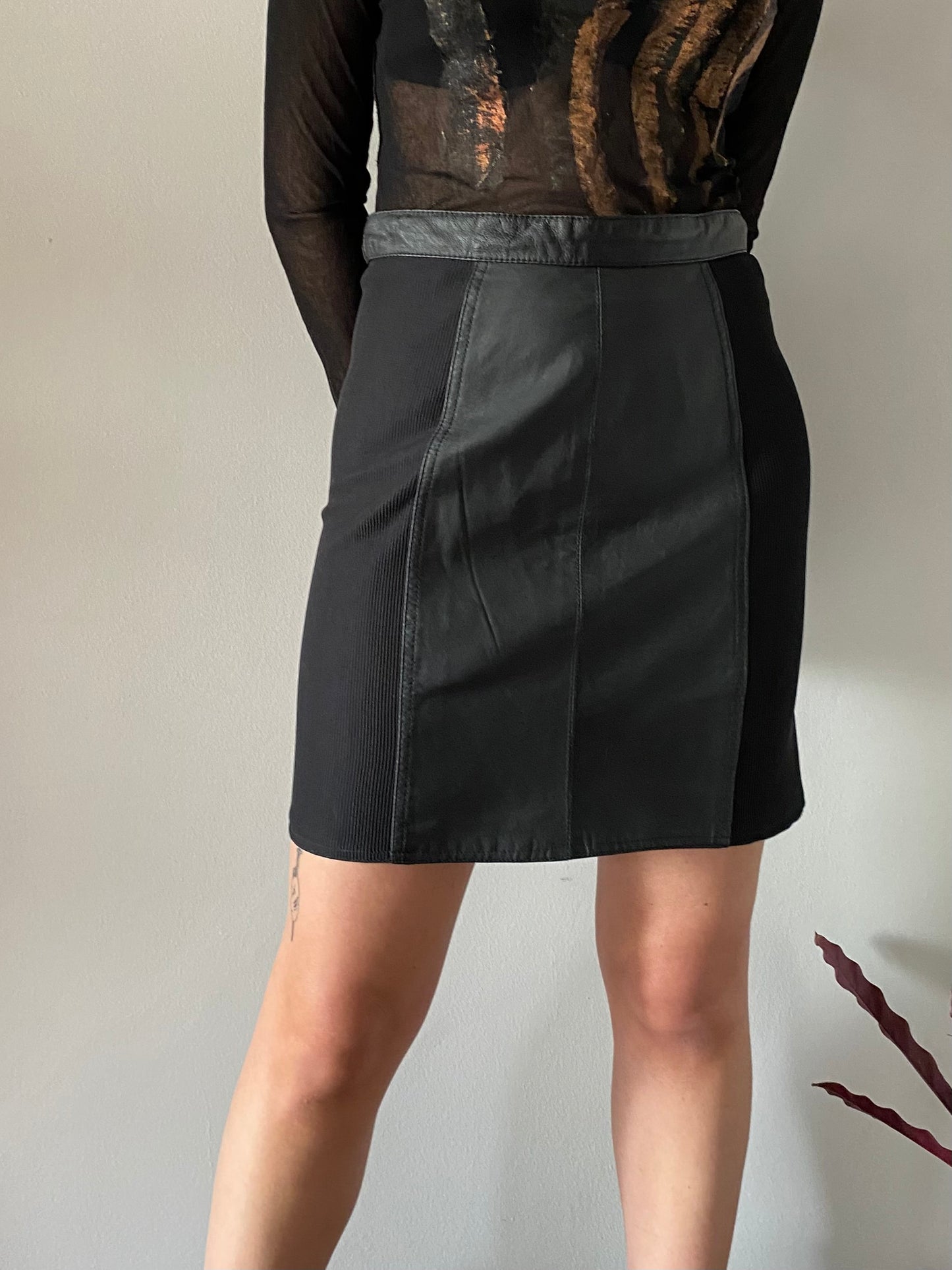 Black leather skirt with elastic sides