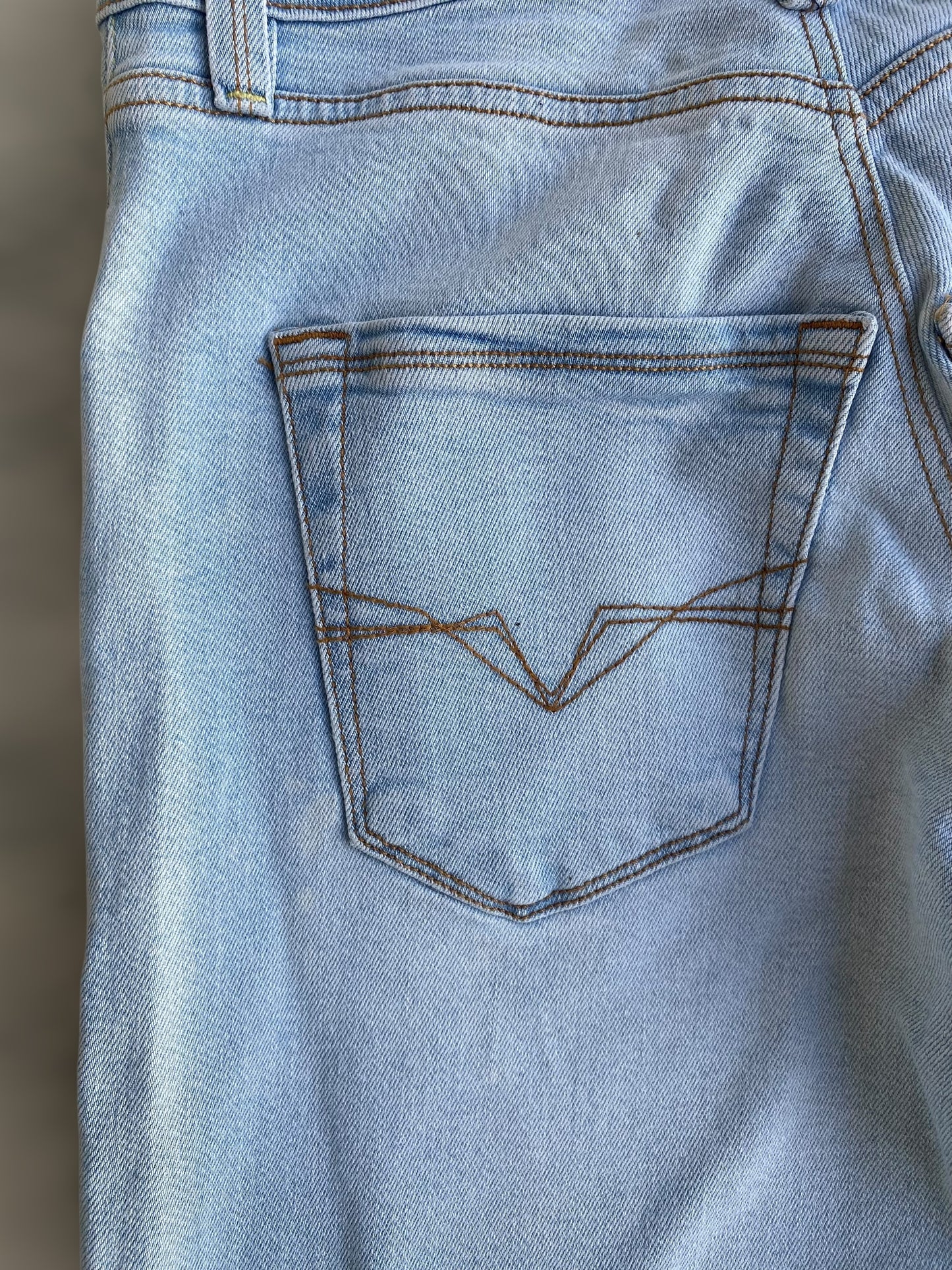 Guess ligh washed low waisted jeans
