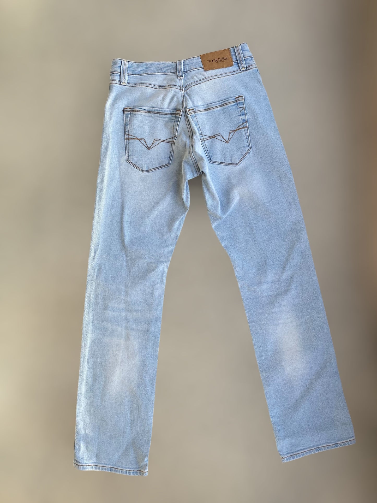 Guess ligh washed low waisted jeans