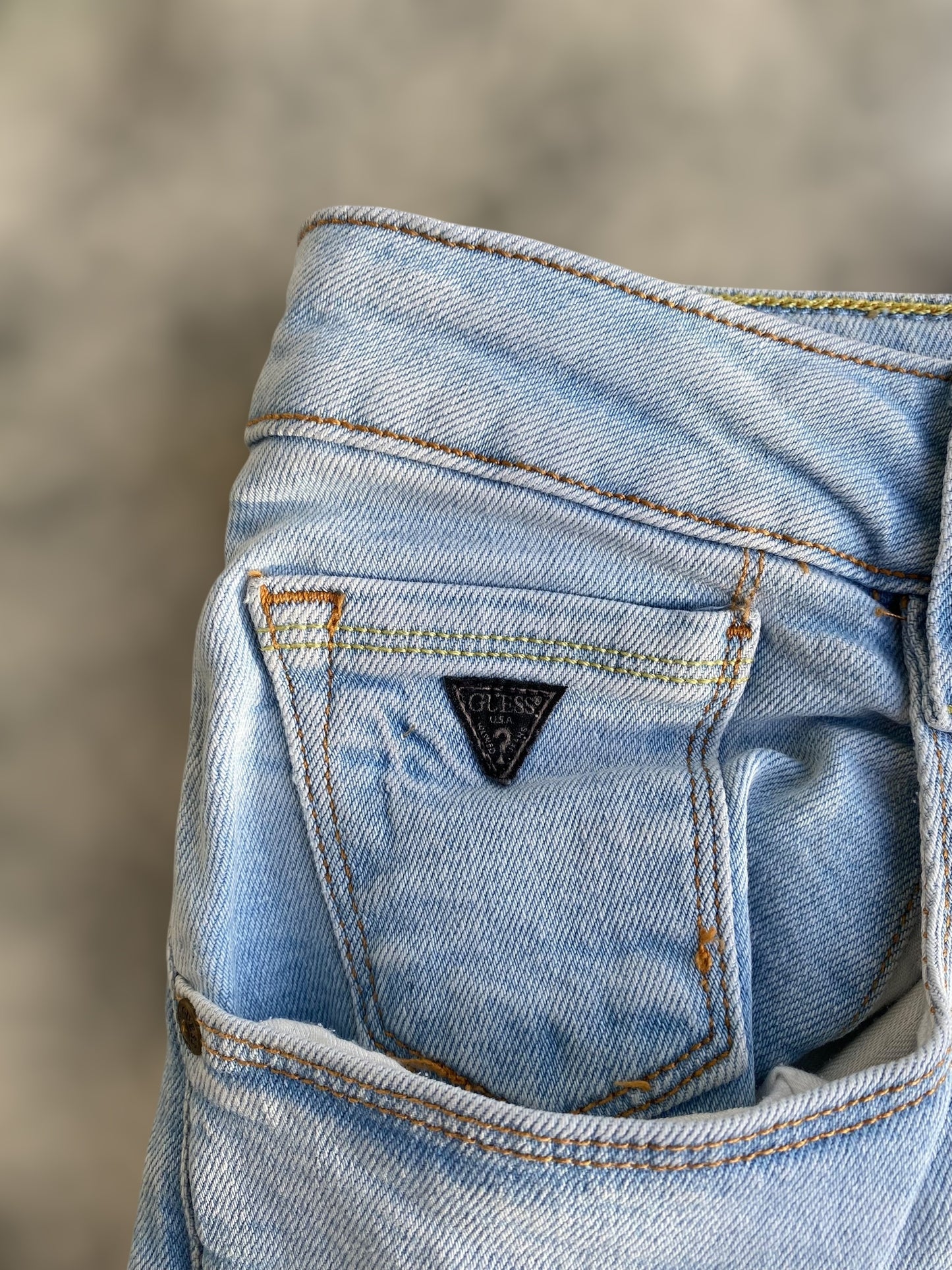 Guess ligh washed low waisted jeans