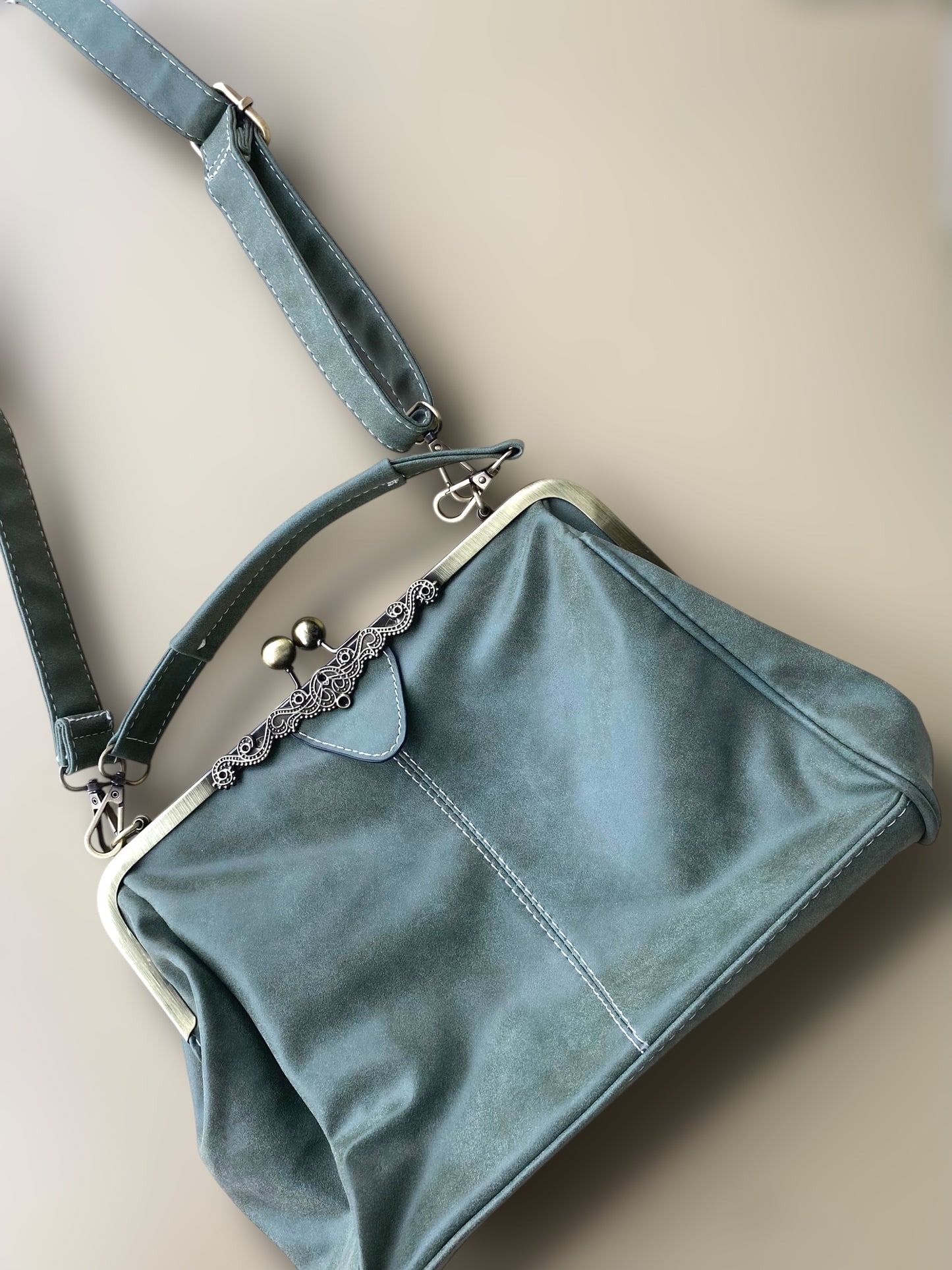 Sage green vintage suede leather clutch bag.
