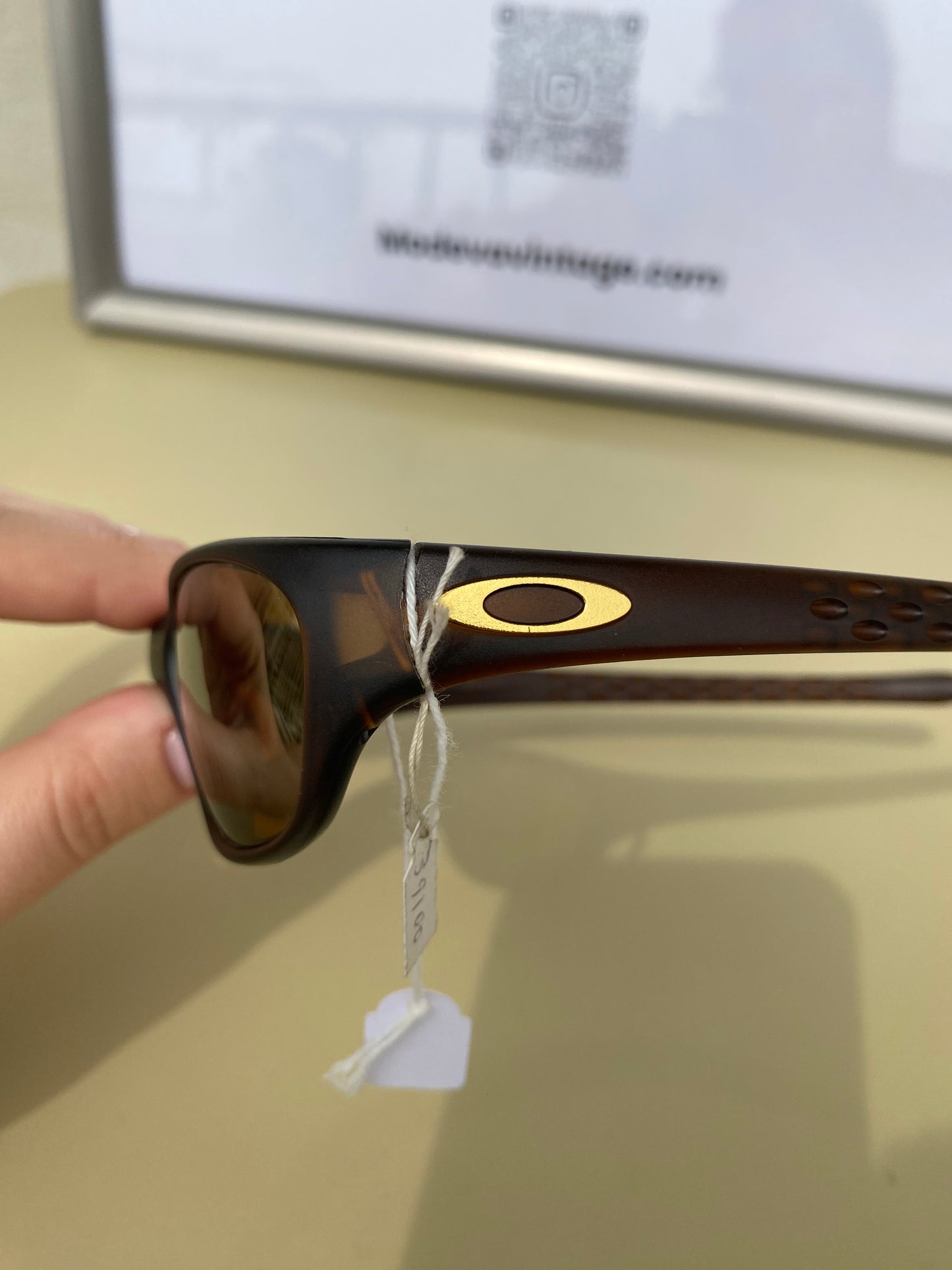 Oakley vintage sunglasses with brown frames and gold lenses