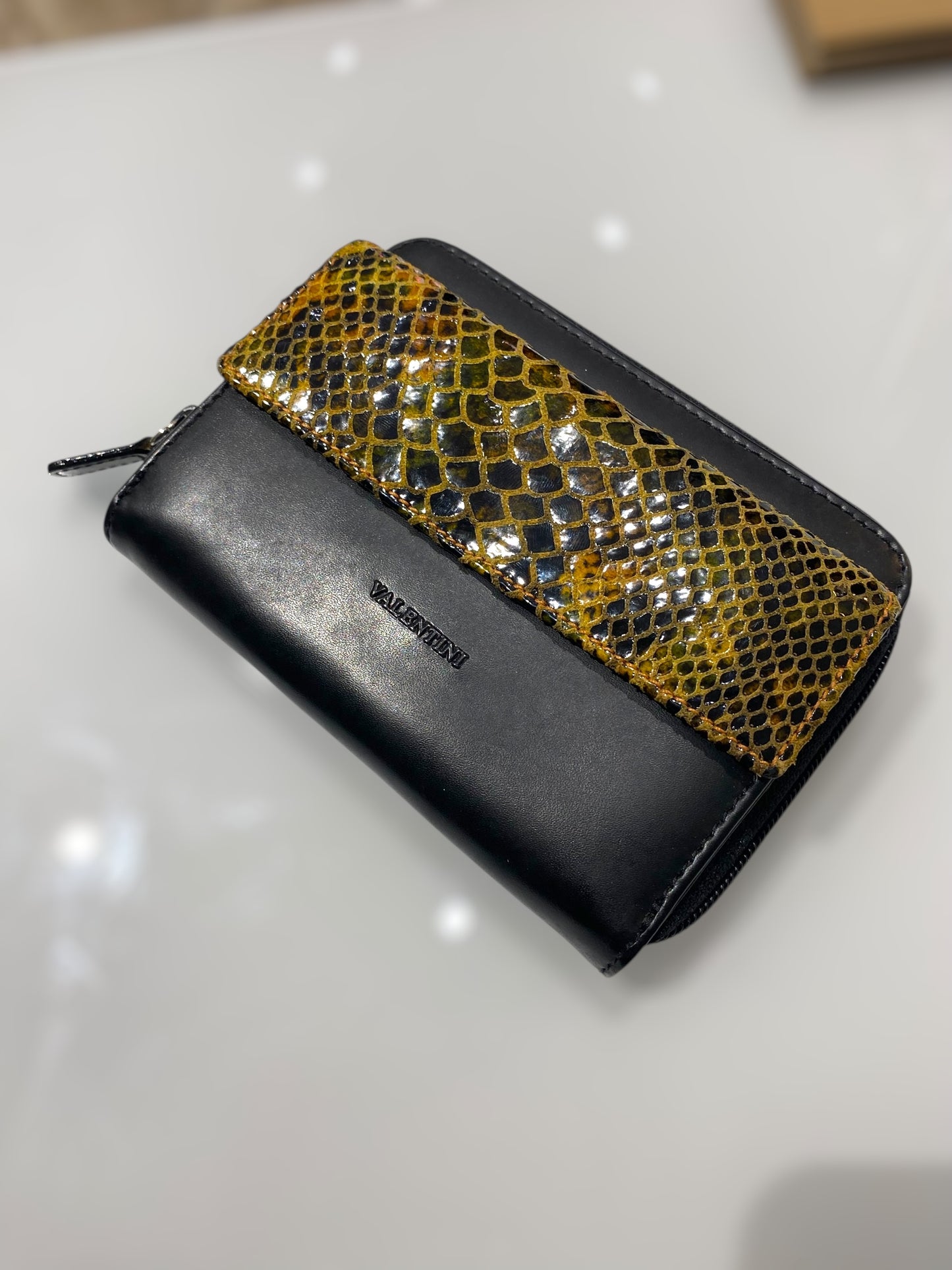 Vintage leather wallet with animal print design