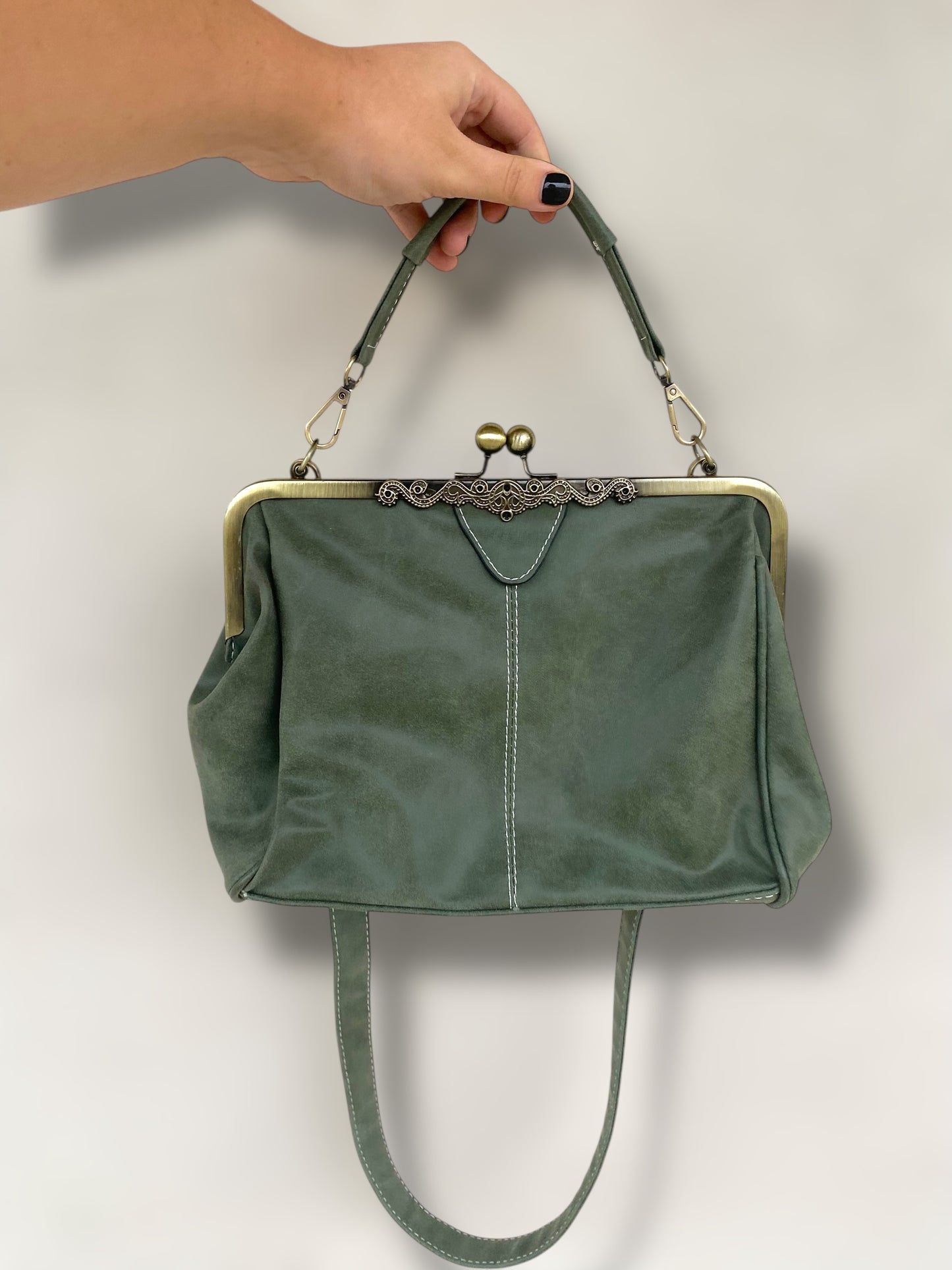 Sage green vintage suede leather clutch bag.