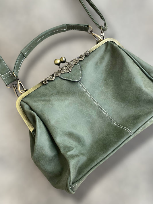 Sage green vintage suede leather clutch bag.