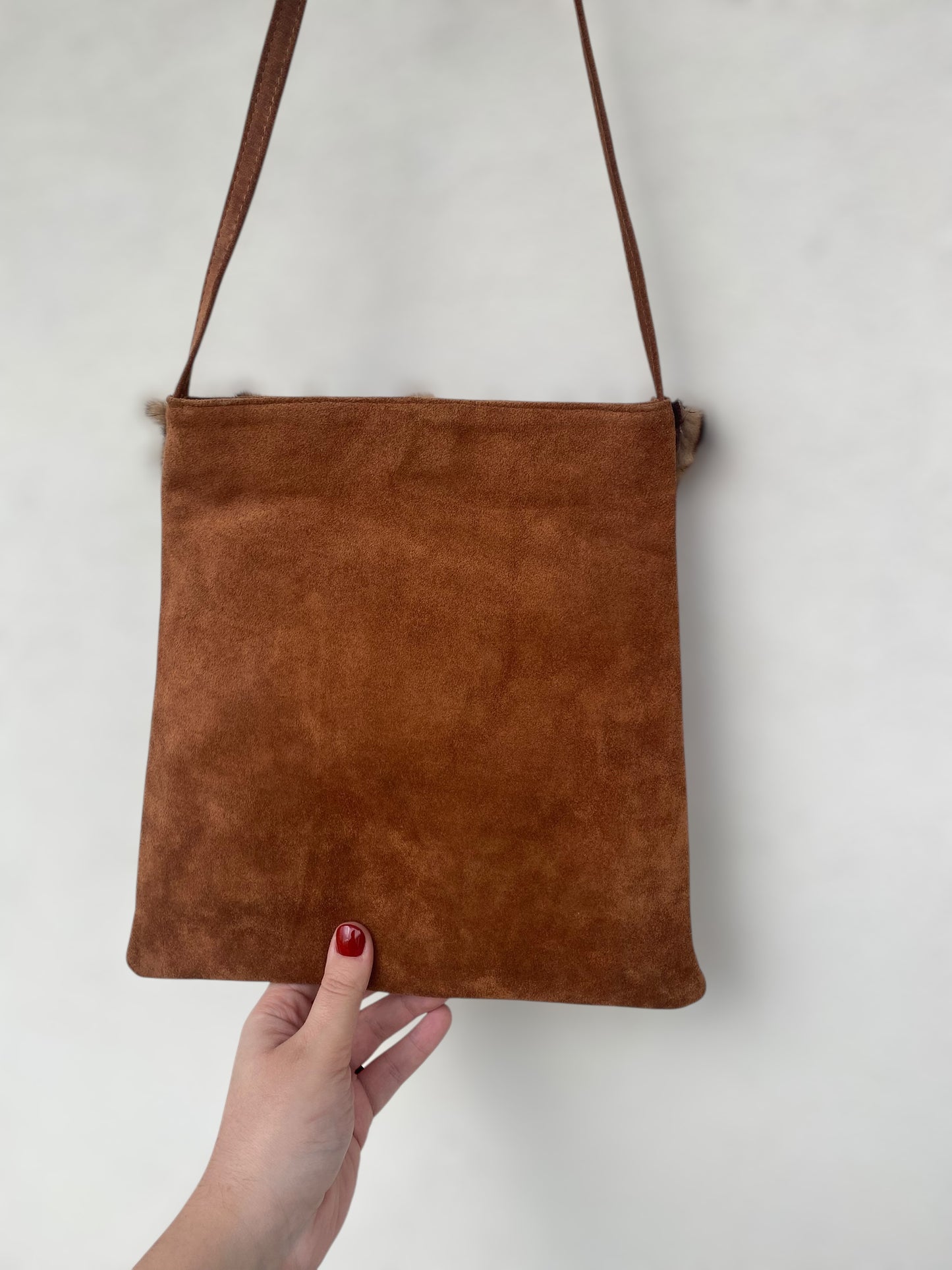 Deadstock suede leather shoulder bag with furry design