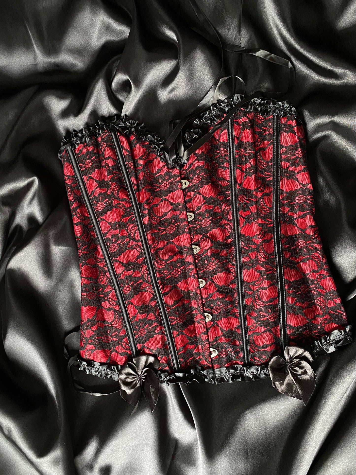 Black and red lace corset