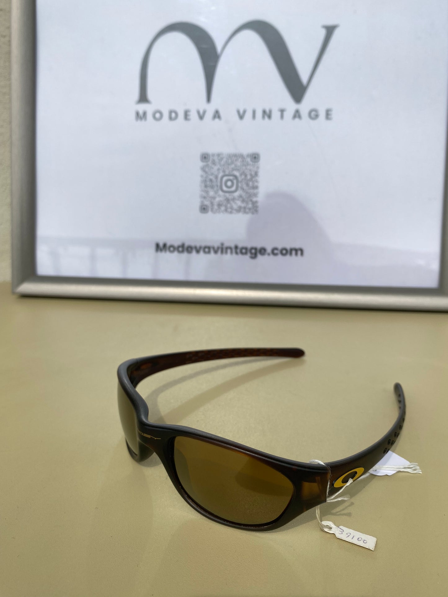Oakley vintage sunglasses with brown frames and gold lenses