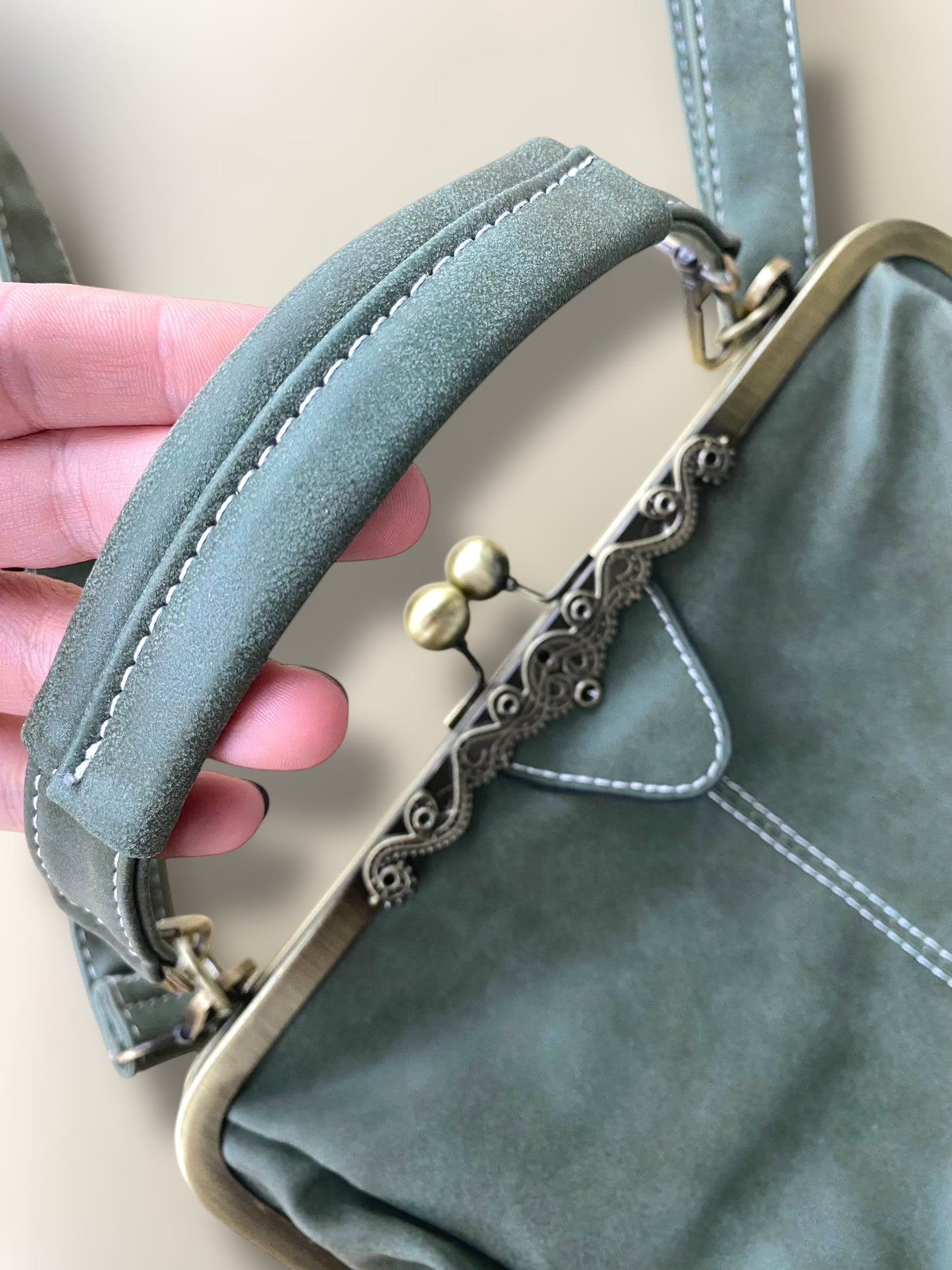 Sage green vintage suede leather clutch bag.