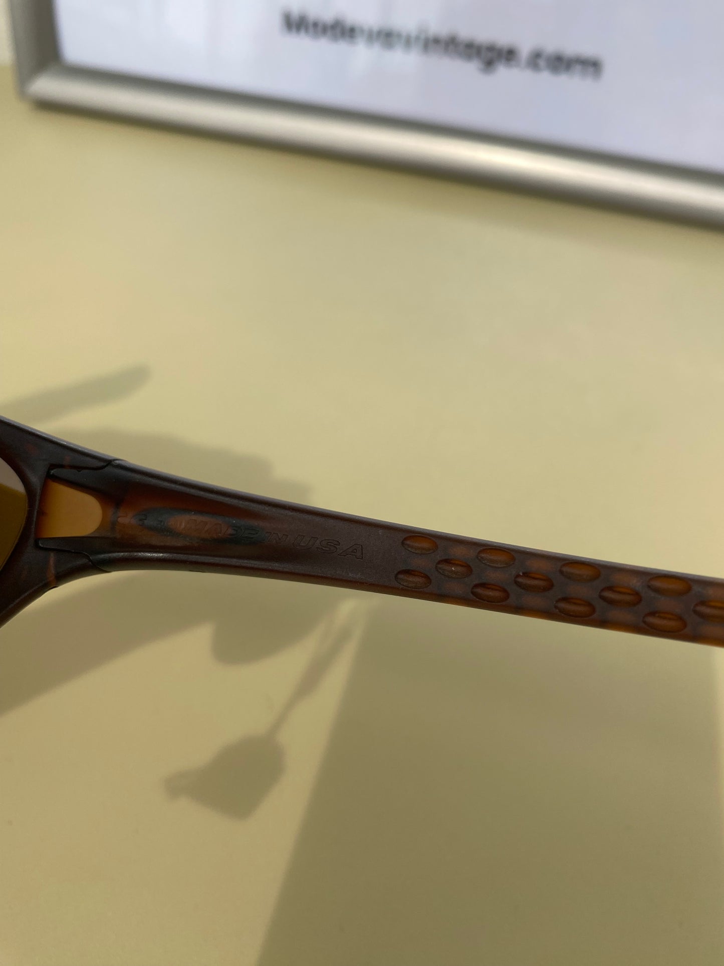 Oakley vintage sunglasses with brown frames and gold lenses