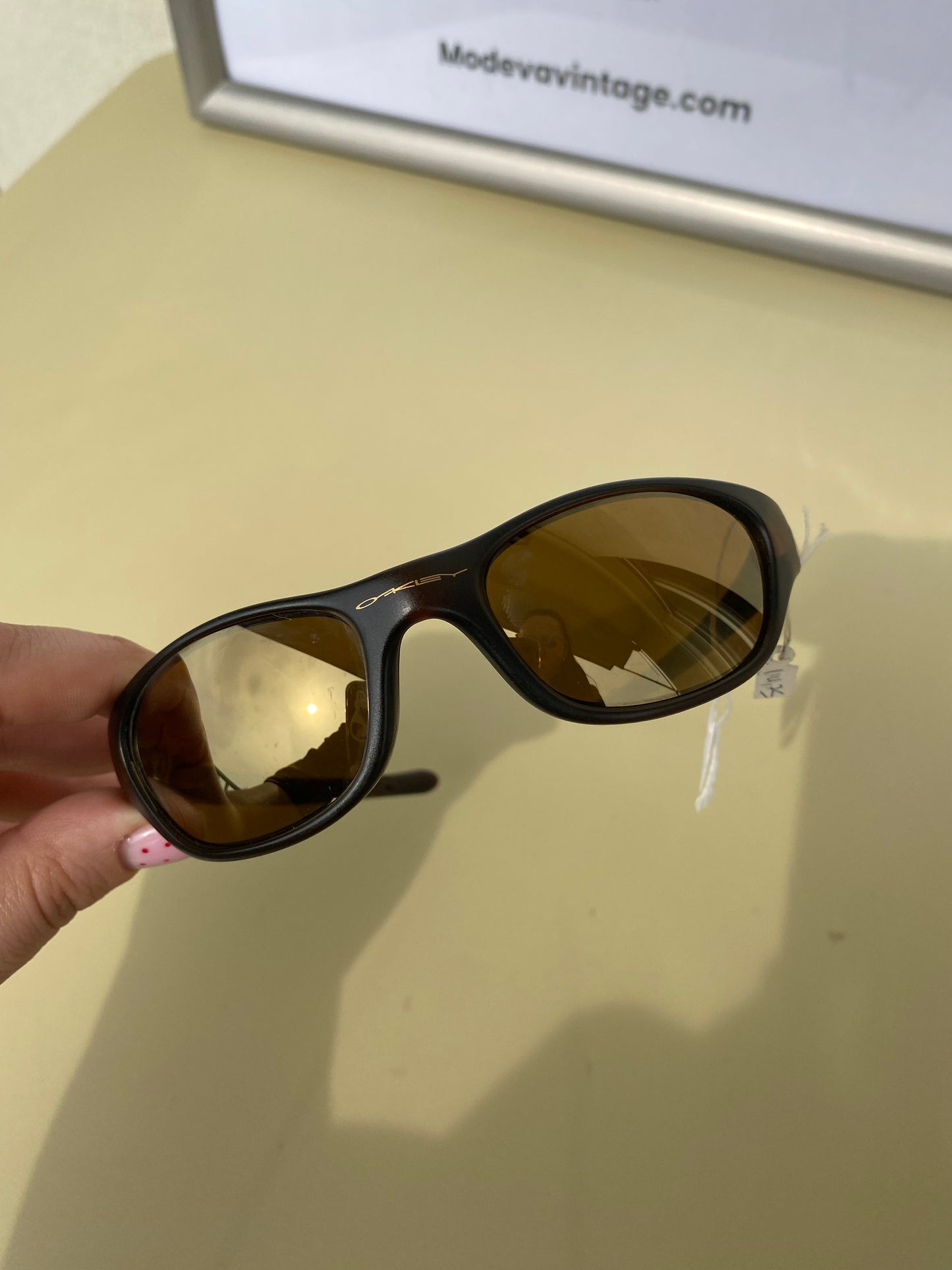 Oakley vintage sunglasses with brown frames and gold lenses