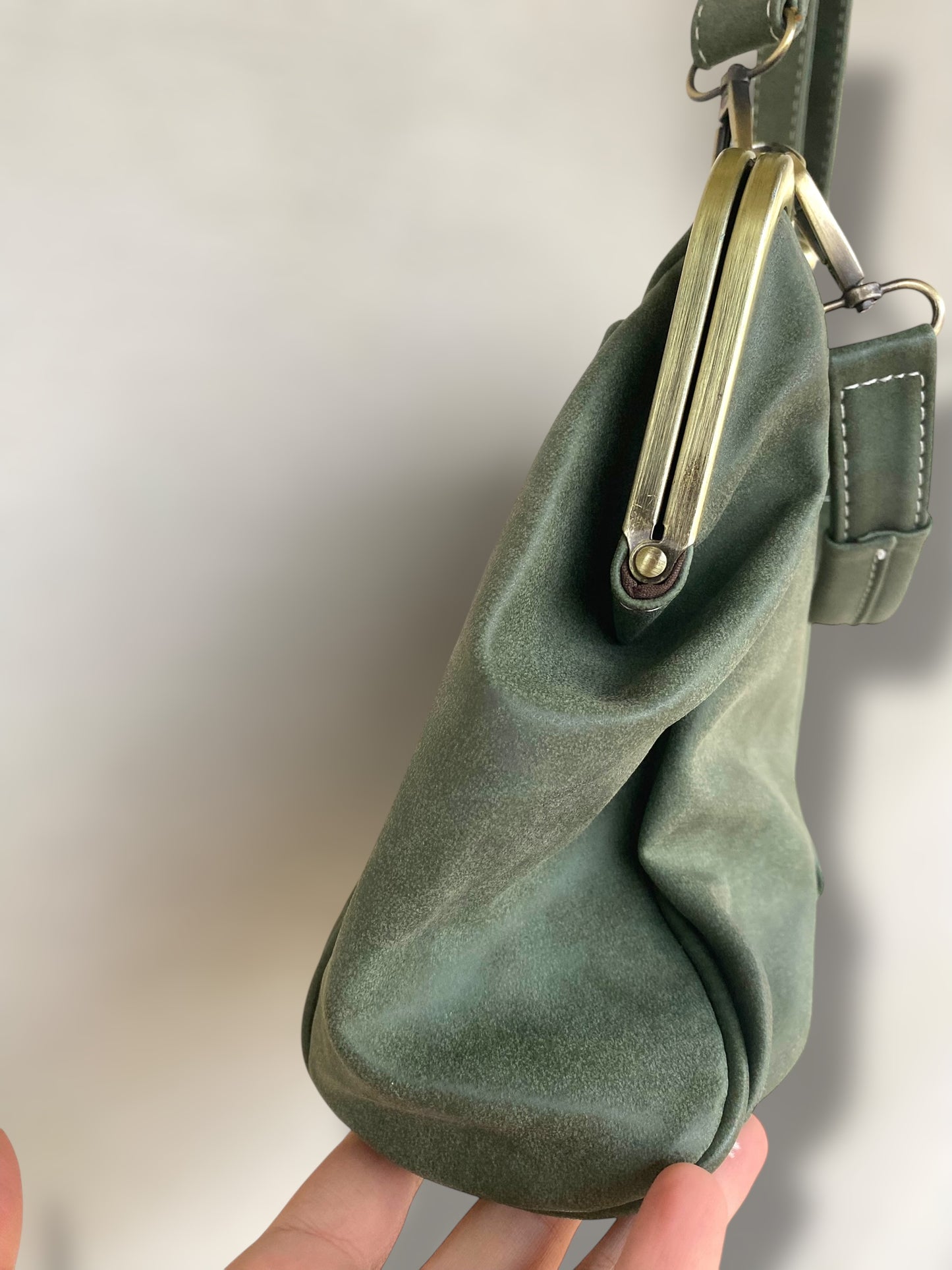Sage green vintage suede leather clutch bag.