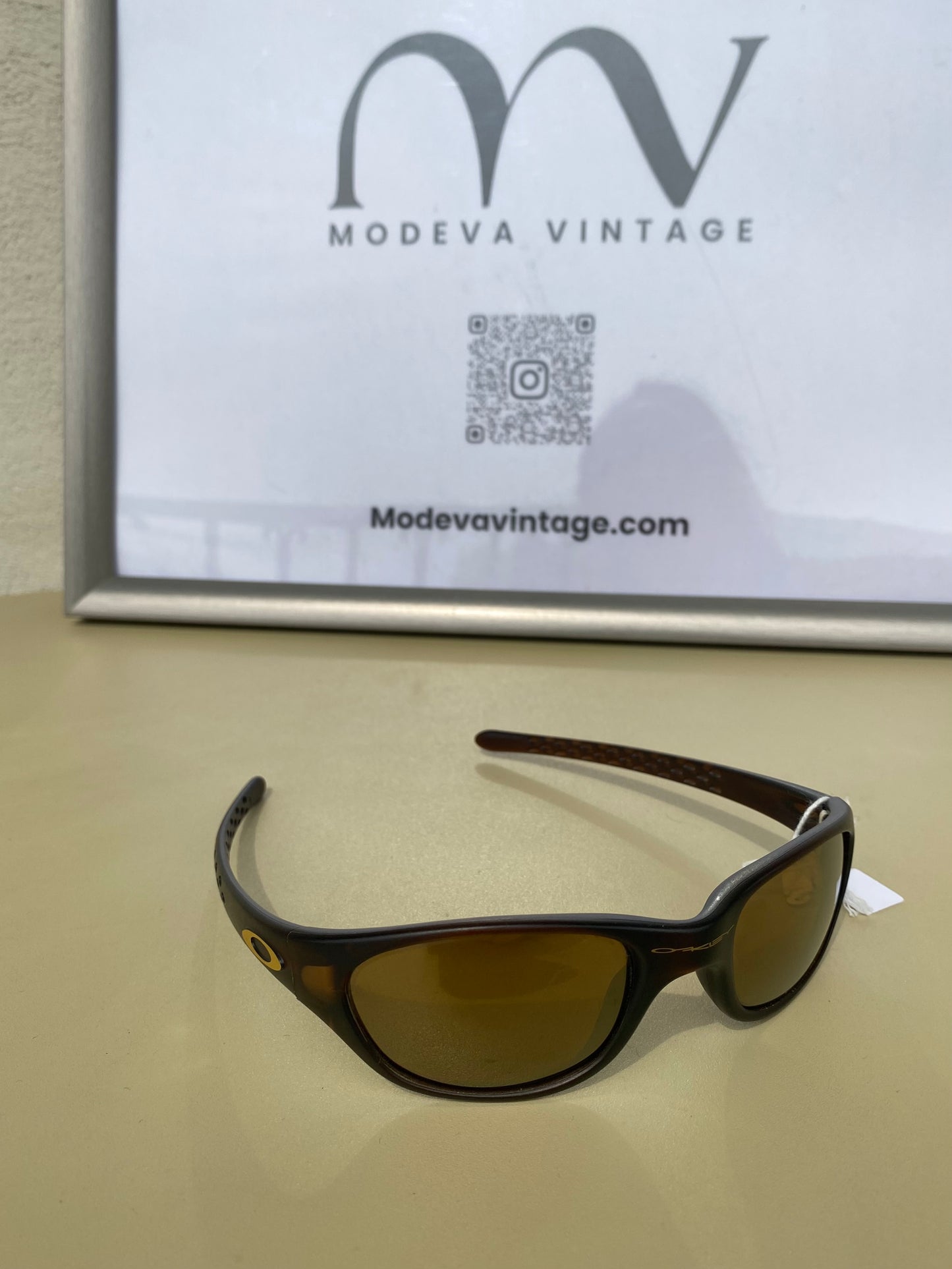 Oakley vintage sunglasses with brown frames and gold lenses