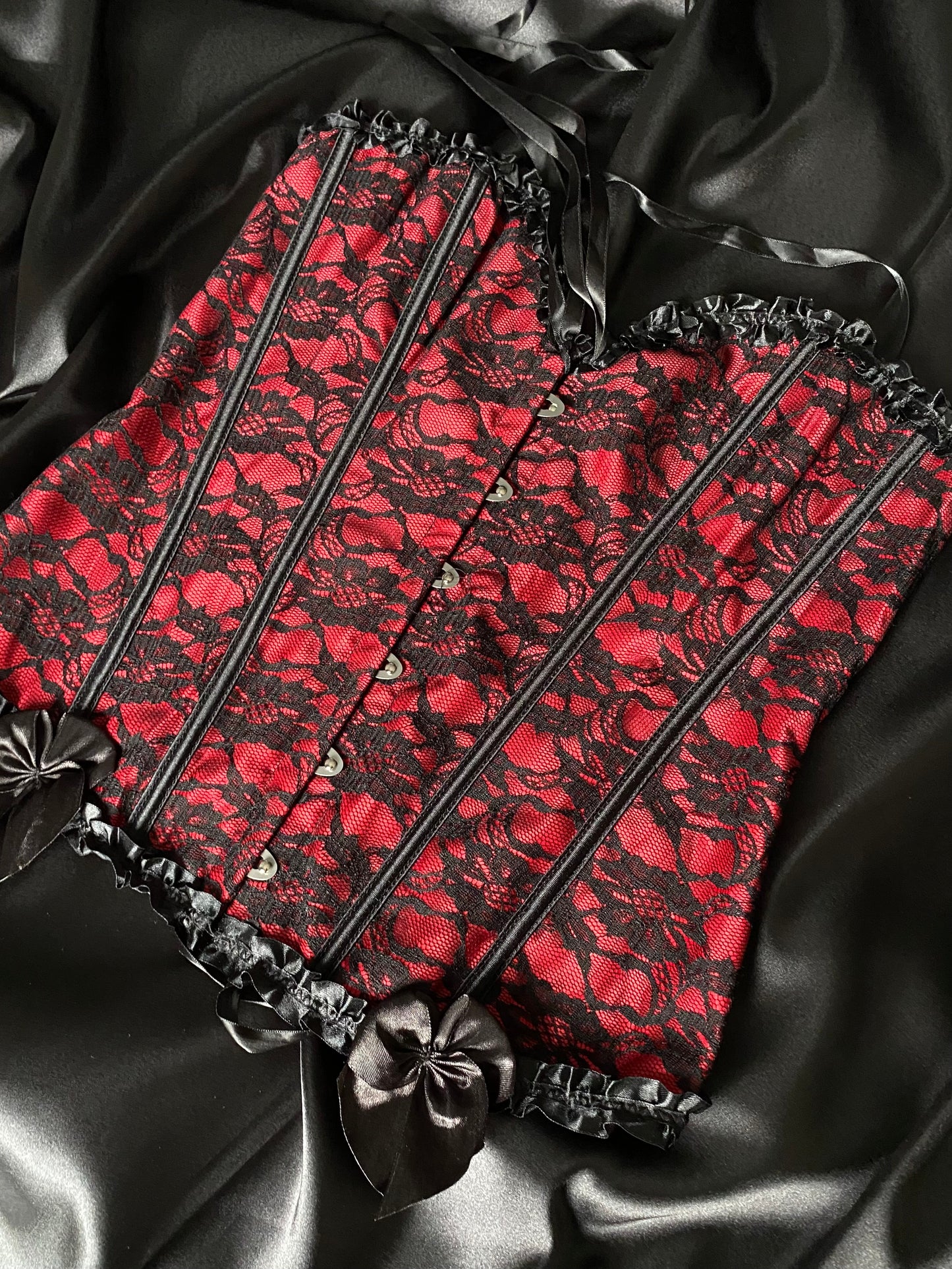 Black and red lace corset