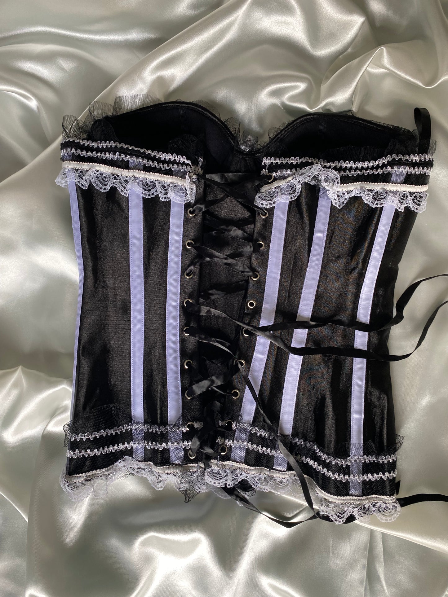 Black corset with white detailing
