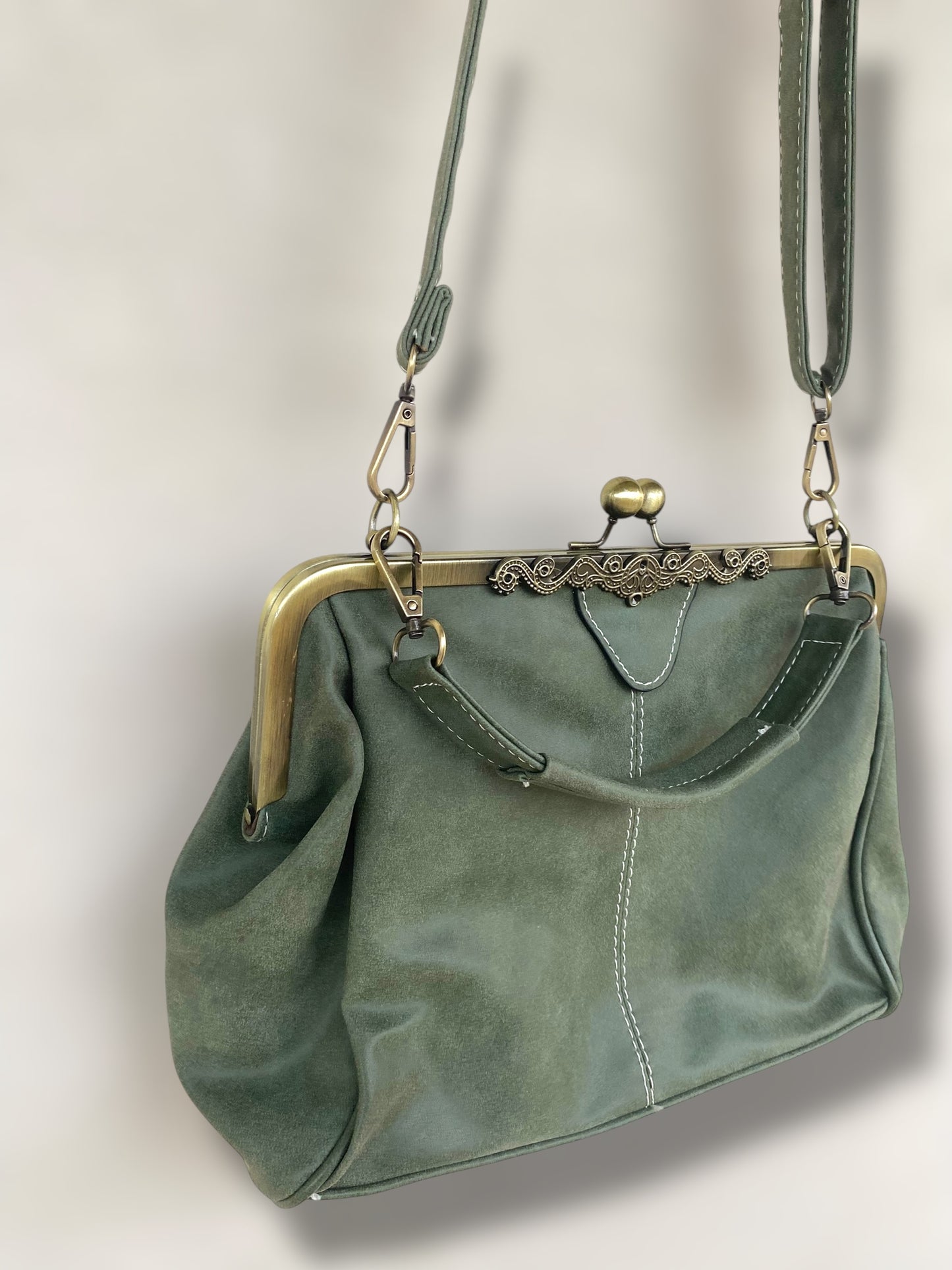 Sage green vintage suede leather clutch bag.