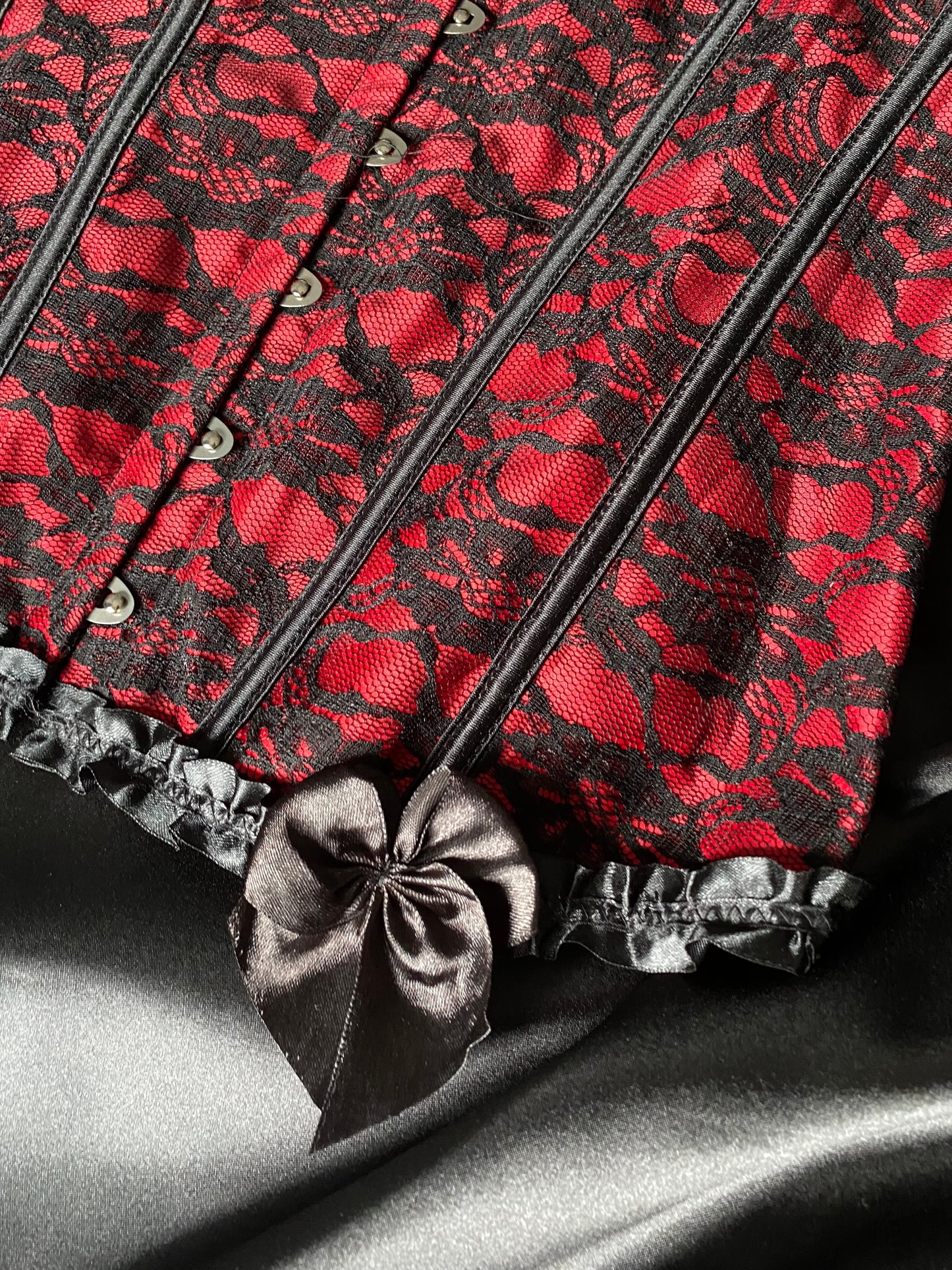 Black and red lace corset