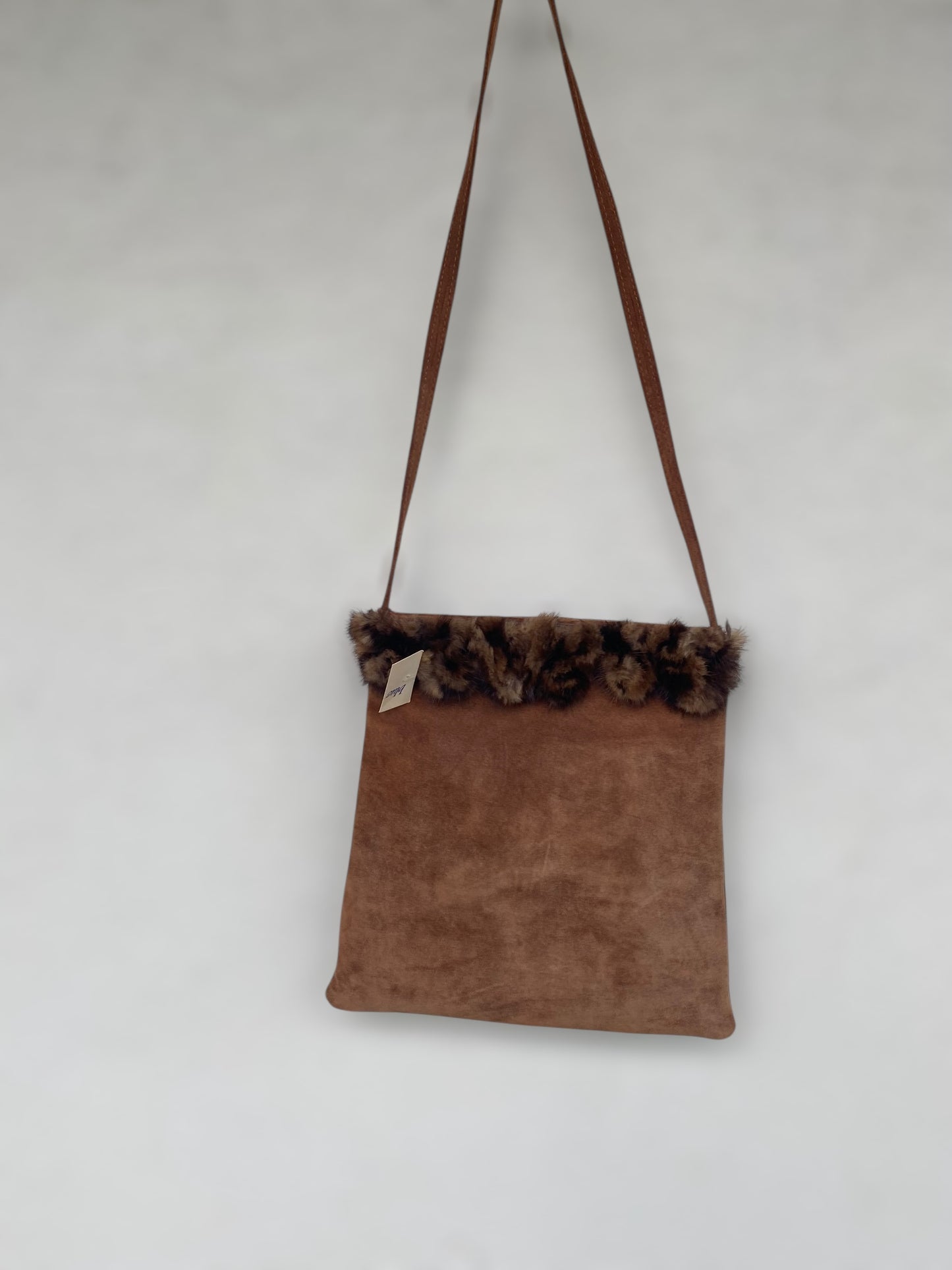 Deadstock suede leather shoulder bag with furry design