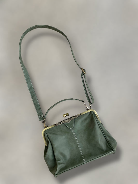 Sage green vintage suede leather clutch bag.